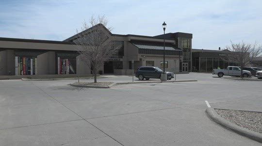 Families ring in the "Noon" Year early at the Kearney Public Library