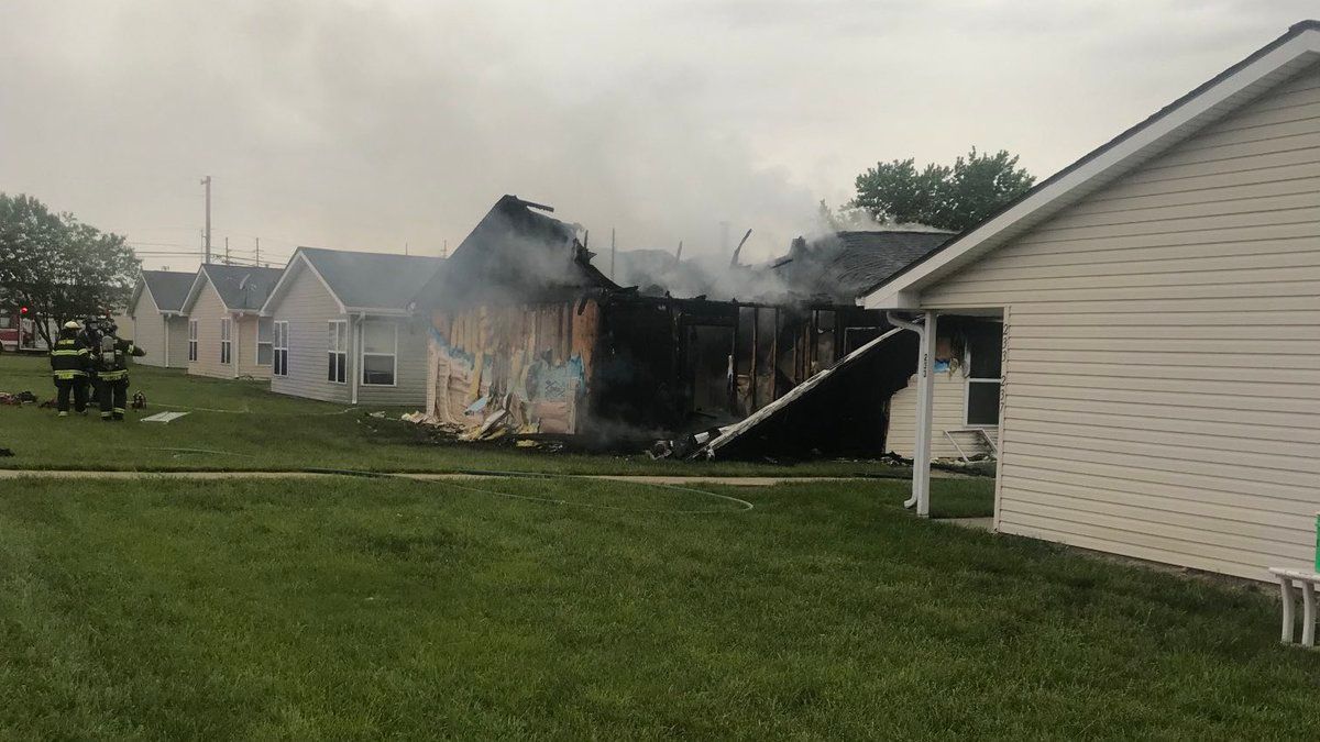 A man ran into the burning structure to save two wheelchair-bound residents and their dog.(KSNB)