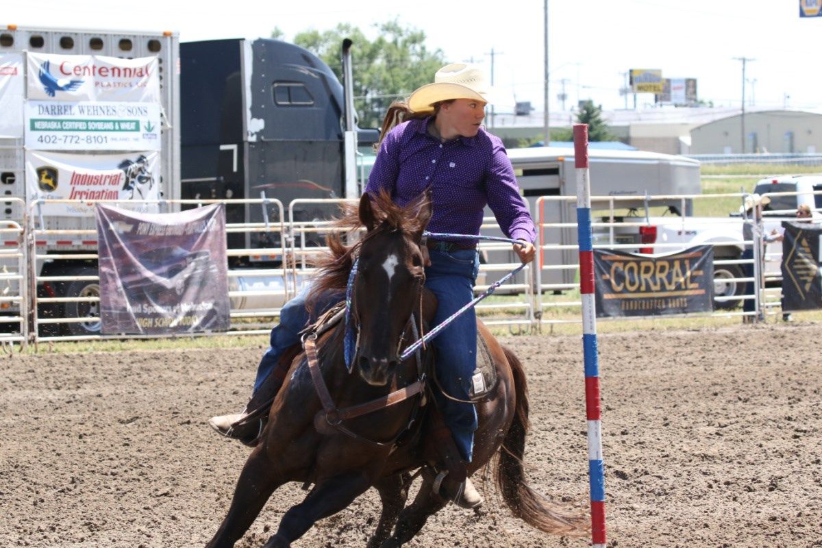 Makayla Wray, Ord, won the pole bending title for the 2021-2022 season; she is also the breakaway roping champion. Photo by Jill Saults.