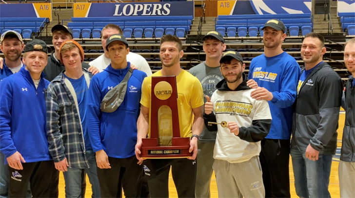 UNK's wrestling team celebrates winning the national championship with a community reception at the Health & Sports Center.