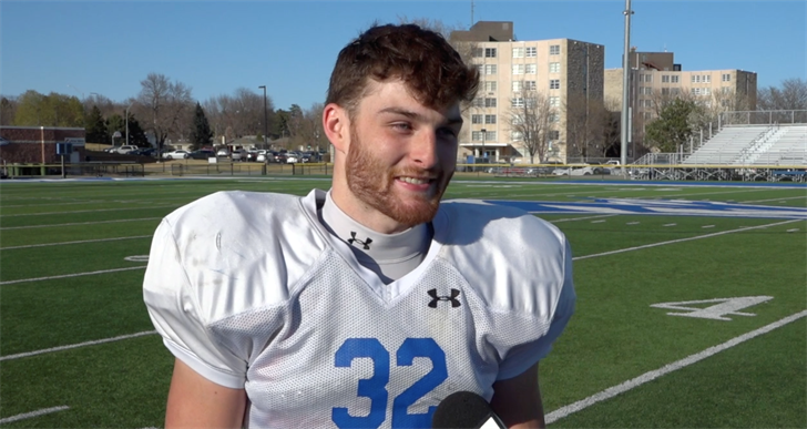 RB Miko Maessner of Kearney participates in an interview during spring practice in 2022.