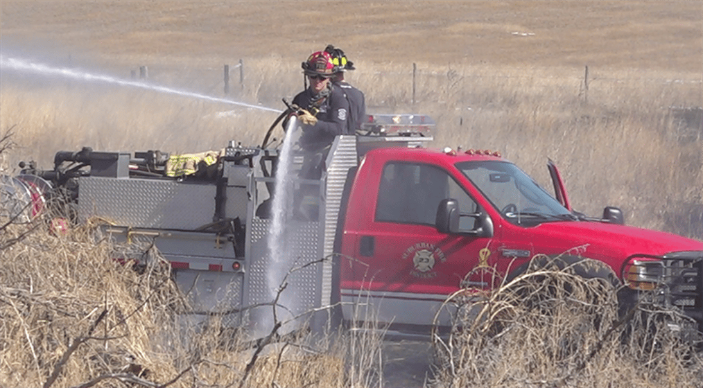 Firefighters work to extinguish blaze North of Kearney Monday Afternoon